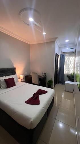 Ένα ή περισσότερα κρεβάτια σε δωμάτιο στο hotel Guidotti