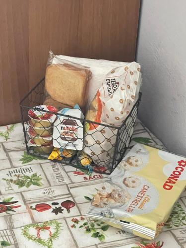 a basket of food sitting on top of a table at Fiordaliso in Caulonia Marina