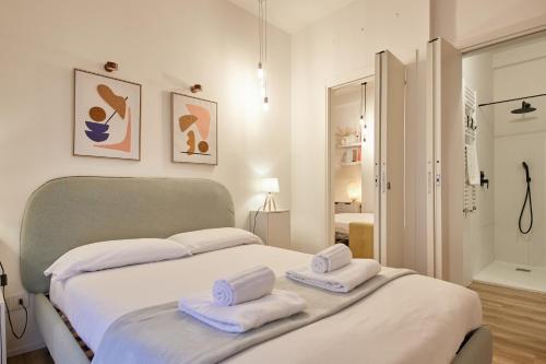 Katil atau katil-katil dalam bilik di Cozy stay San Siro Stadium & Spa Escape