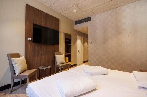 Letto o letti in una camera di Grand Hotel Riva