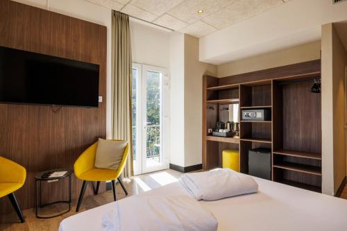 Posteľ alebo postele v izbe v ubytovaní Grand Hotel Riva