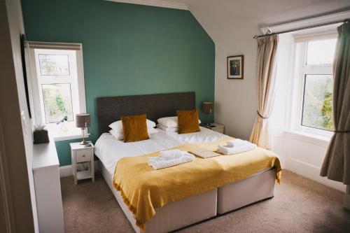 Postel nebo postele na pokoji v ubytování Heatherfield House