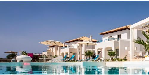 a view of the villas from the swimming pool at Kaladi Rock Ammos in Avlemonas