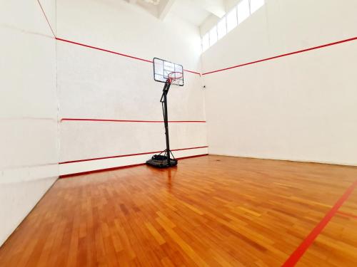a basketball hoop in a room with a wooden floor at Koi Kinrara 2 Room Puchong IOI Bkt Jalil Pavillion Sunway Pyramid Lagoon Hospital Old Klang Road in Puchong