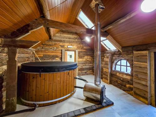a large wooden room with a large barrel in the ceiling at The Farmhouse Private HOT TUB & SAUNA & TV-CINEMA Room Very Special Home Near Cannock Chase in Colton