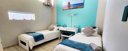 Ένα ή περισσότερα κρεβάτια σε δωμάτιο στο Seagull 506