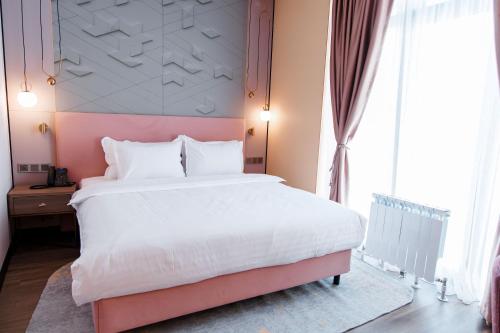 Postel nebo postele na pokoji v ubytování Gulkam Resort