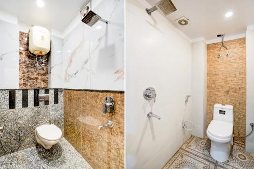 a bathroom with a toilet and a shower at Hotel N Maharani in New Delhi