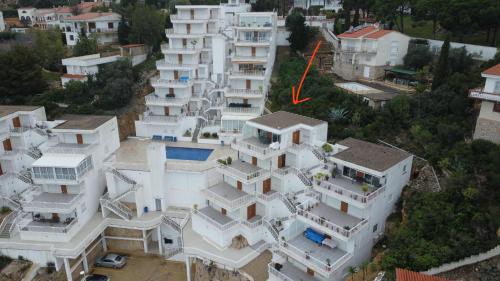 an aerial view of a large white apartment building at Estrella II in Peñíscola