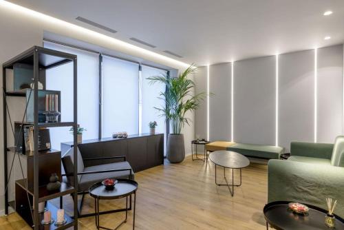 Zona de estar de Acropolis Magenta Luxury Suites