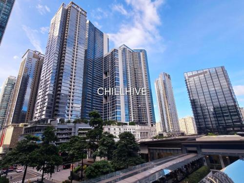 a group of tall buildings in a city at Exclusive BGC Condo at Uptown Area #upt136d in Manila