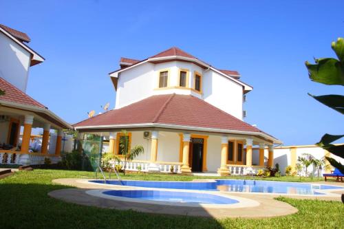 Πισίνα στο ή κοντά στο Greenfield Villa D- Diani