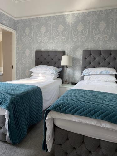 Katil atau katil-katil dalam bilik di Haversham House - Adults Only