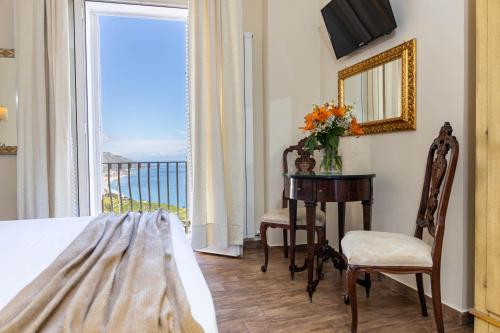 A bed or beds in a room at Pascià Cappuccini