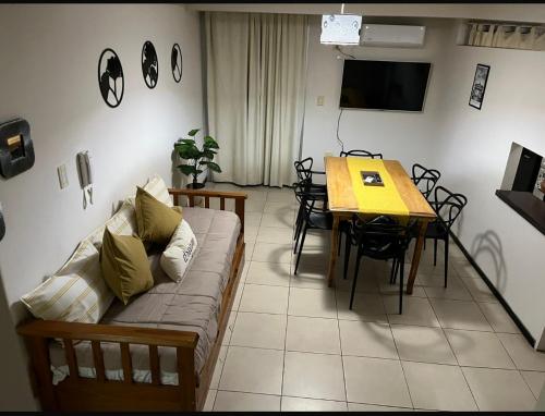 a living room with a couch and a table at Dpto centrico in Santiago del Estero