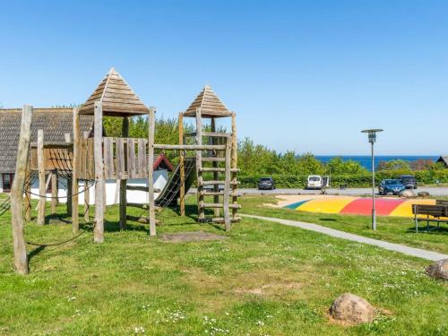 a park with a playground with a slide at Apartment Markus - 300m from the sea by Interhome in Allinge