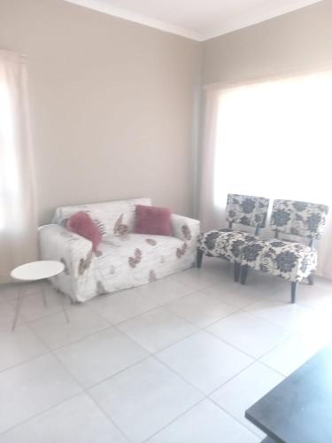 Χώρος καθιστικού στο TnK Abode Apartments