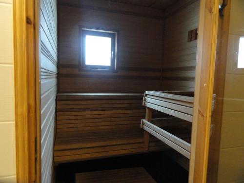 Palanda nebo palandy na pokoji v ubytování Saimaa Houses