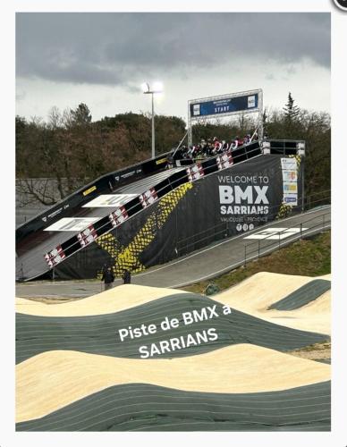 a race car on a track with a ramp at Duplex en terrasse sur les toits de Provence in Sarrians