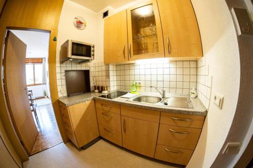 Η κουζίνα ή μικρή κουζίνα στο Flow Apartments WINKEL ATELIER
