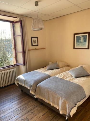 Postel nebo postele na pokoji v ubytování LaVieTara