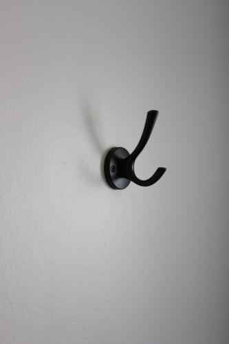 a black door knob on a white wall at Luxury Heights Bed and Breakfast in Newcastle