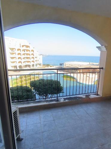 a view of the ocean from a balcony at PSB Apartments in Midia Resort Aheloy in Aheloy