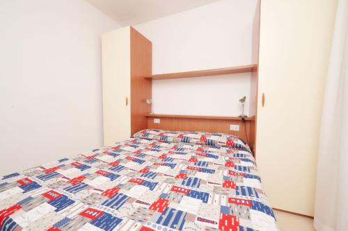 Postel nebo postele na pokoji v ubytování Pineta Azzurra