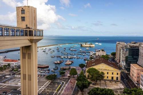 a view of a harbor with boats in the water at Yellow house 1 in Salvador