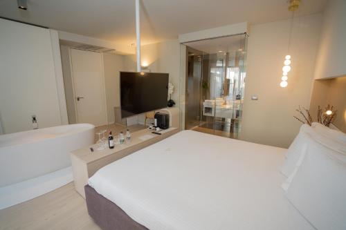 Ένα ή περισσότερα κρεβάτια σε δωμάτιο στο Lake Drive Rooms&Apartments