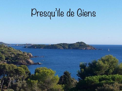 a view of a large body of water with trees at Le Port Plage Studio tout confort Terrasse Clim in Hyères