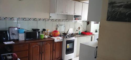 Dapur atau dapur kecil di apartamento cop30