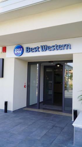 an office building with a sign that reads best western at Best Western Hotel Massafra in Massafra