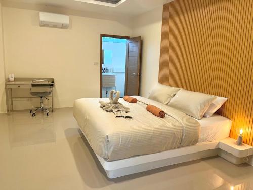 Ένα ή περισσότερα κρεβάτια σε δωμάτιο στο South Beach Inn