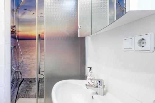a bathroom with a sink and a shower at Ferienwohnung Hochtal in Bernau im Schwarzwald