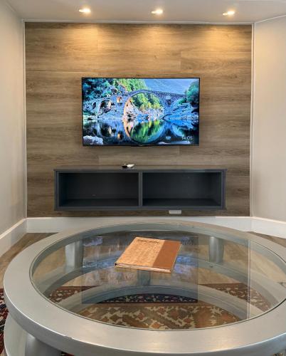 TV a/nebo společenská místnost v ubytování Dolphin Dunes Guesthouse