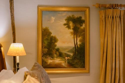 a picture of a painting on a wall at The Crown, Bildeston in Bildeston