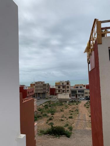 a view of a city from a building at Nomad Surf Lodge in Imsouane