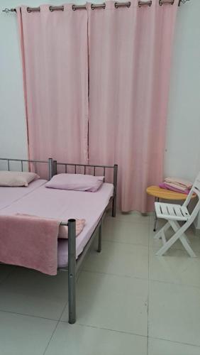 Vuode tai vuoteita majoituspaikassa Ghubrah Mohammad dormitory