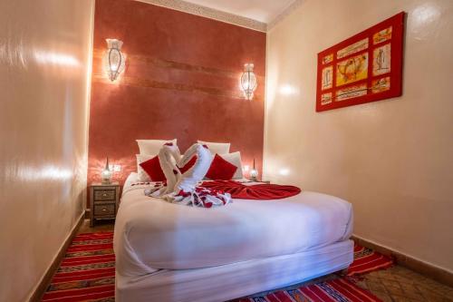 Postel nebo postele na pokoji v ubytování Riad Alaka