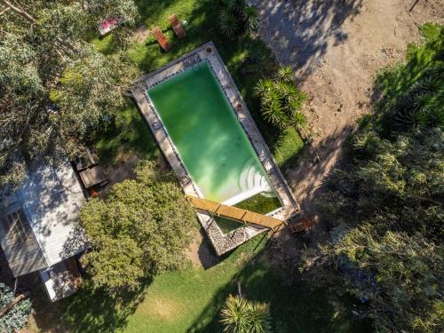 an overhead view of a large pool of water at Bosques del Paico in El Monte