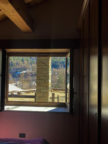 a window in a room with a view at Chalet da Luca in Ceresole Reale