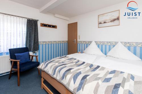 En eller flere senge i et værelse på Töwerland Zimmer 5