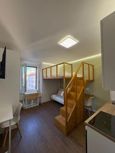 Giường trong phòng chung tại Porta Romana Chic Nest - Monolocale Moderno nel cuore di Milano
