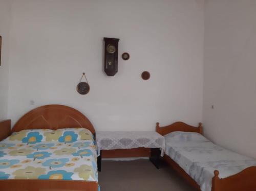 Postel nebo postele na pokoji v ubytování Casa privata con giardino Bardha lungomare