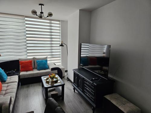 TV a/nebo společenská místnost v ubytování Hermoso departamento, céntrico y tranquilo