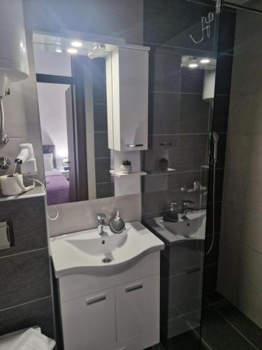 Koupelna v ubytování Apartments Miš