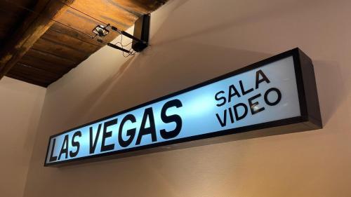 a sign that reads las vegas sell a video at Koru House Ariccia in Ariccia