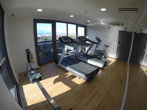 an overhead view of a gym with two tread machines at Kyriad Troyes Centre in Troyes