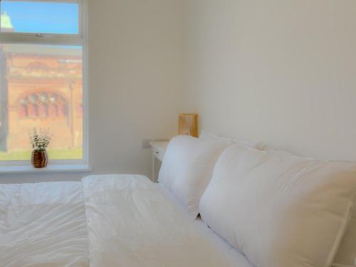 Ένα ή περισσότερα κρεβάτια σε δωμάτιο στο Pavilion - Beachfront Property